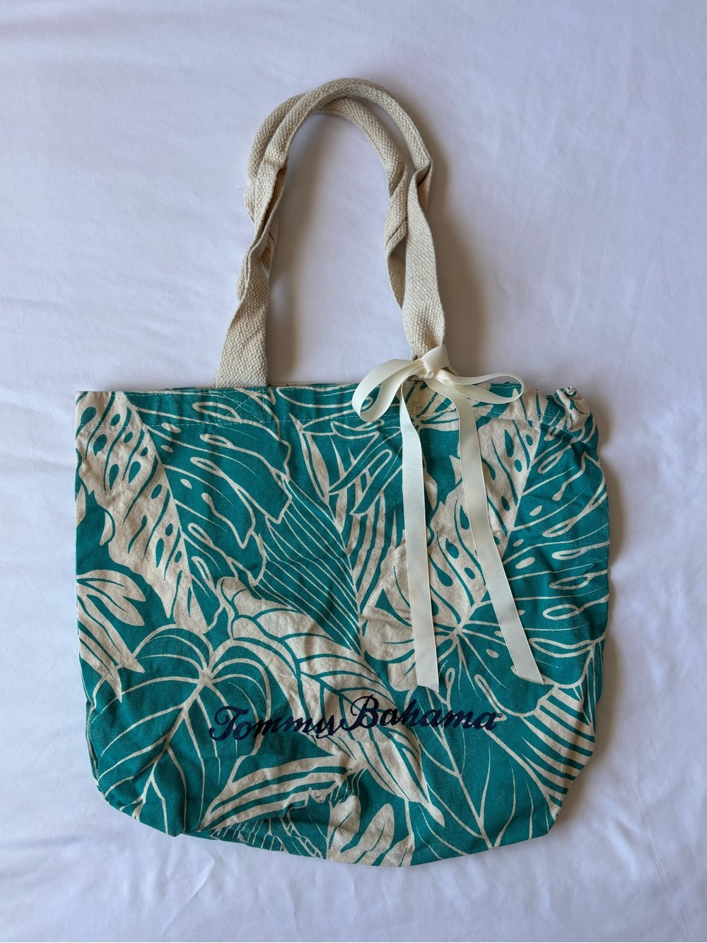 Tommy Bahama tote bag with white and teal leaf print